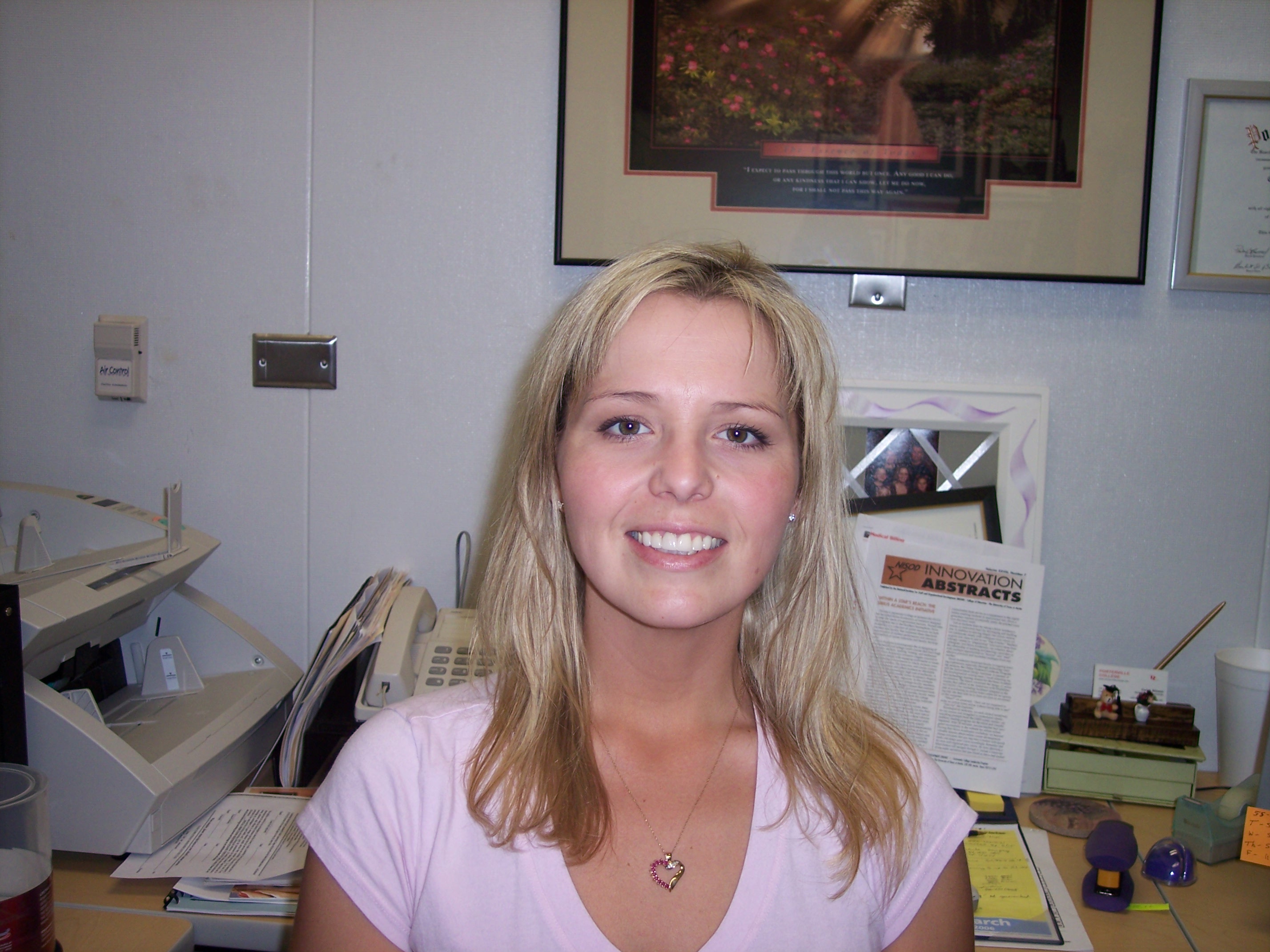 A photo of Carrie in her office.